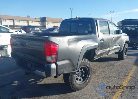 2016 Toyota Tacoma Trd Off Road z USA, uszkodzony, nr VIN 3TMAZ5CN4GM013887